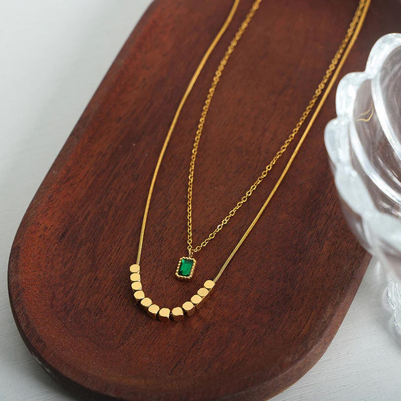 Elegant Emerald Envy Necklace with Yellow Gold Plating, anti-tarnish, and hypoallergenic design.
