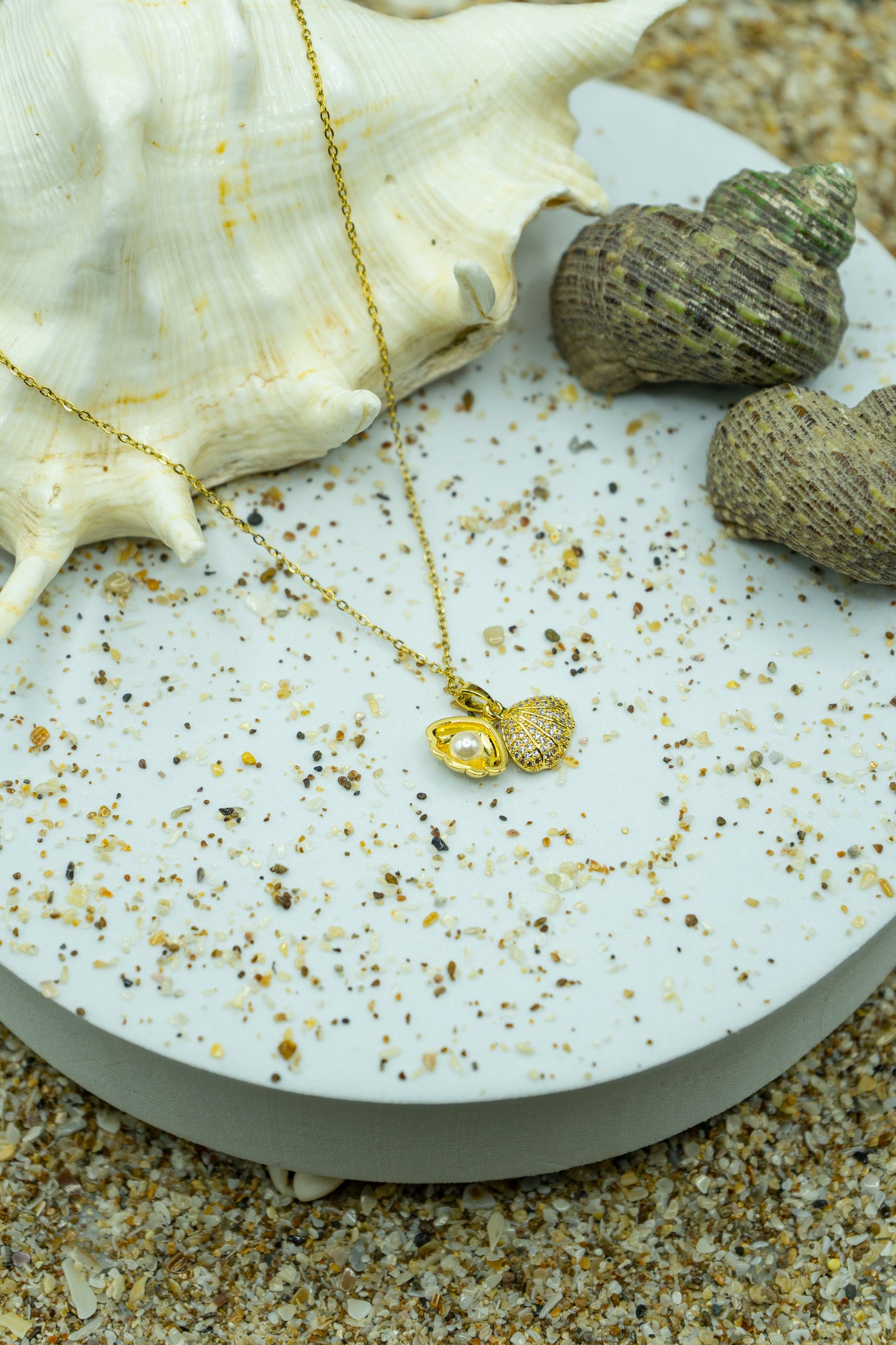 Crystal Shell Necklace in Yellow Gold Plated Stainless Steel, part of an affordable fashion jewelry collection