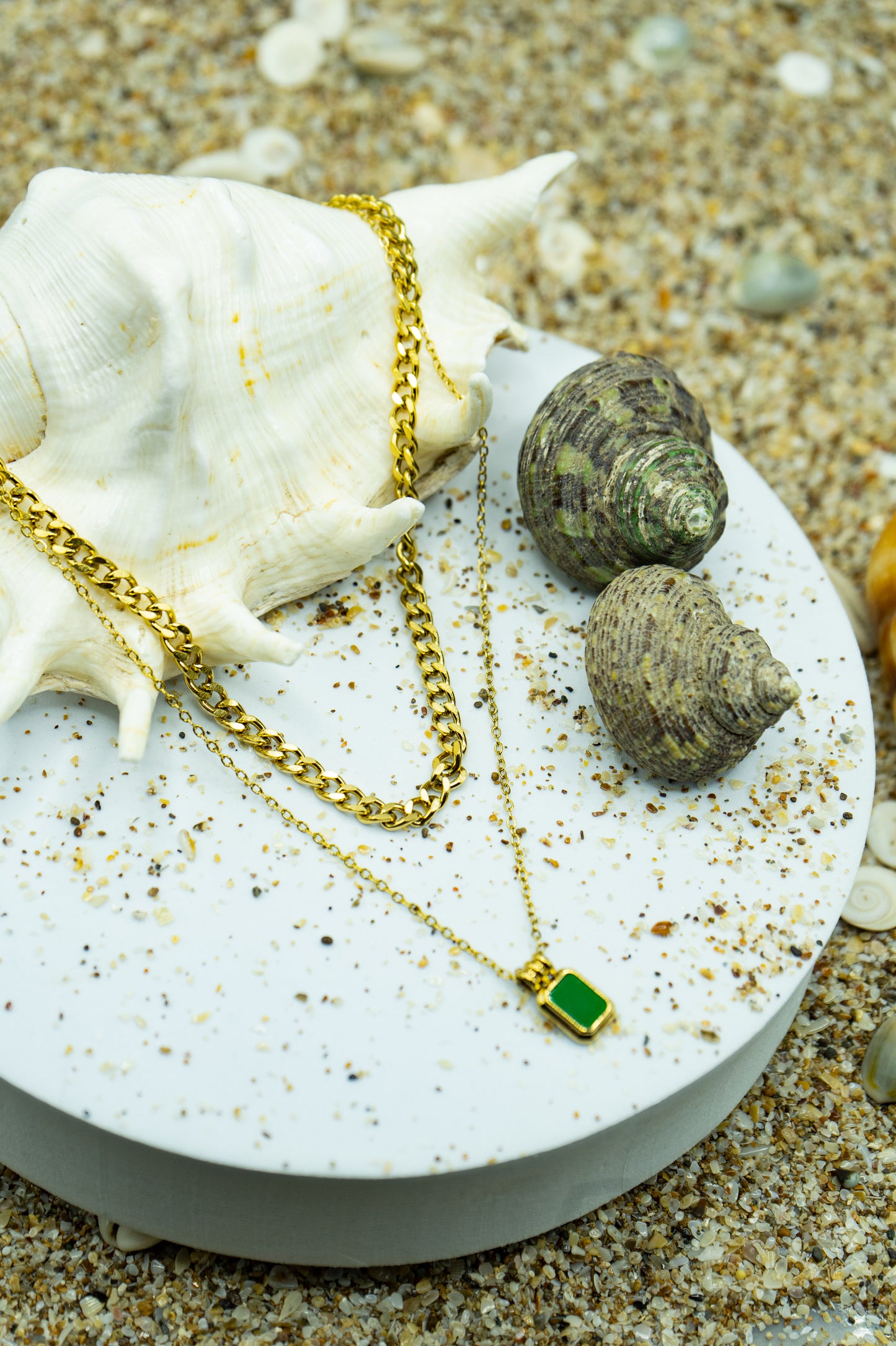 Stylish Green Stone Layered Necklace with yellow gold plating, anti-tarnish finish, and hypoallergenic design.