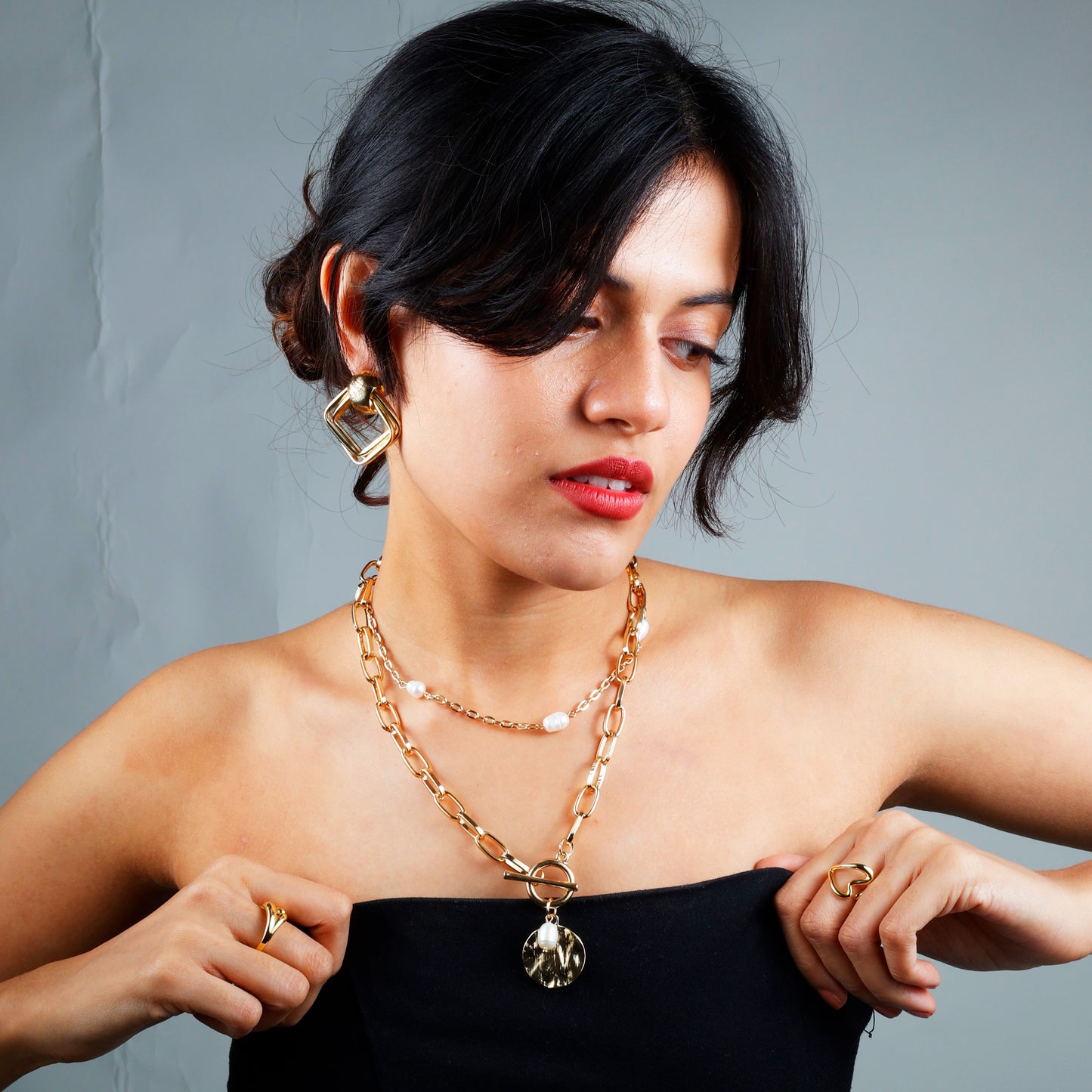 Elegant layered pearl necklace with yellow gold plating, anti-tarnish finish, and hypoallergenic design for timeless style.