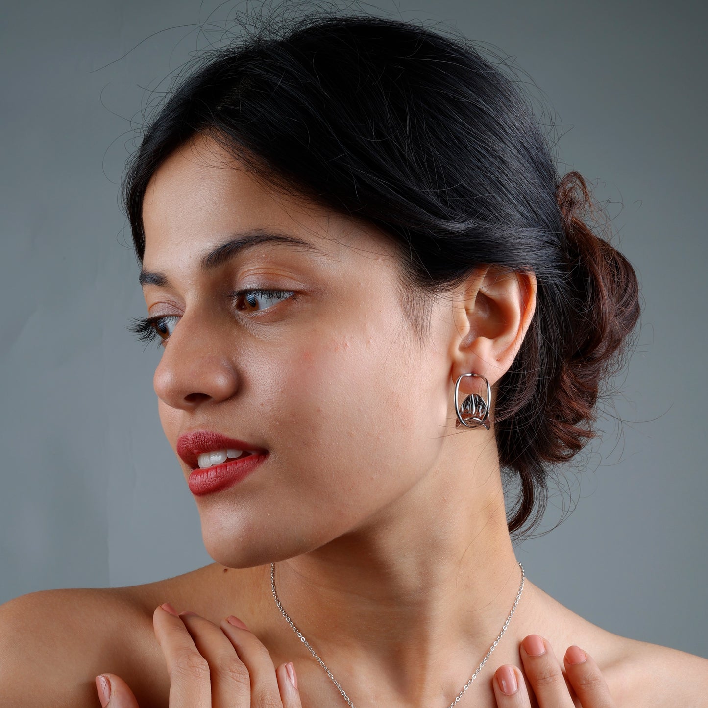 Stylish modern hoop earrings with rhodium plating, anti-tarnish finish, and hypoallergenic design.