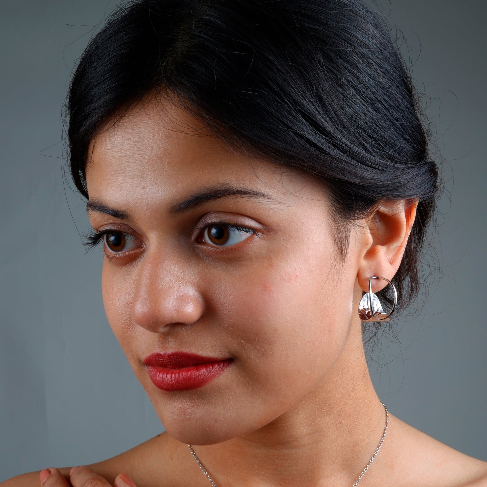 Stylish modern hoop earrings with rhodium plating, anti-tarnish finish, and hypoallergenic design.