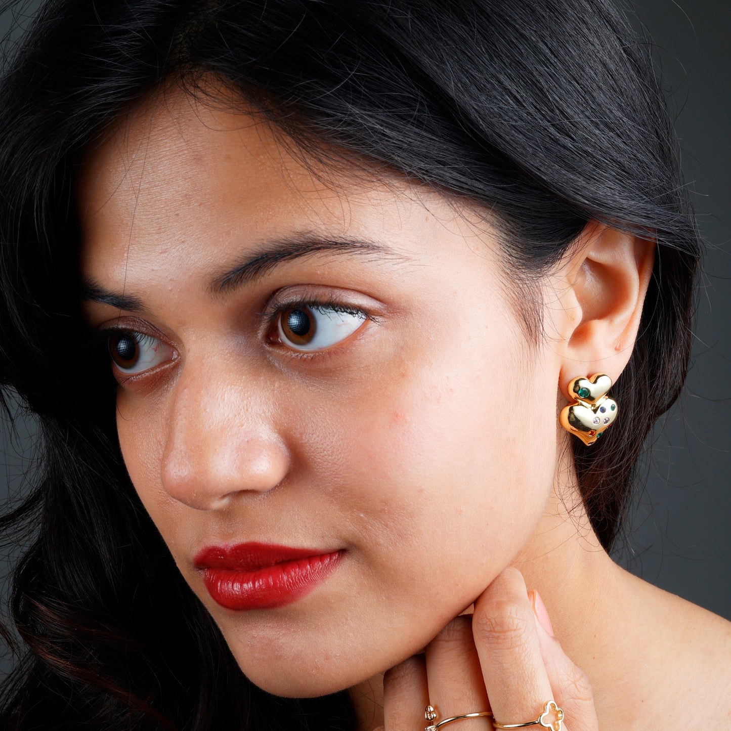 Elegant Double Heart Earrings with yellow gold plating, anti-tarnish finish, and hypoallergenic design.