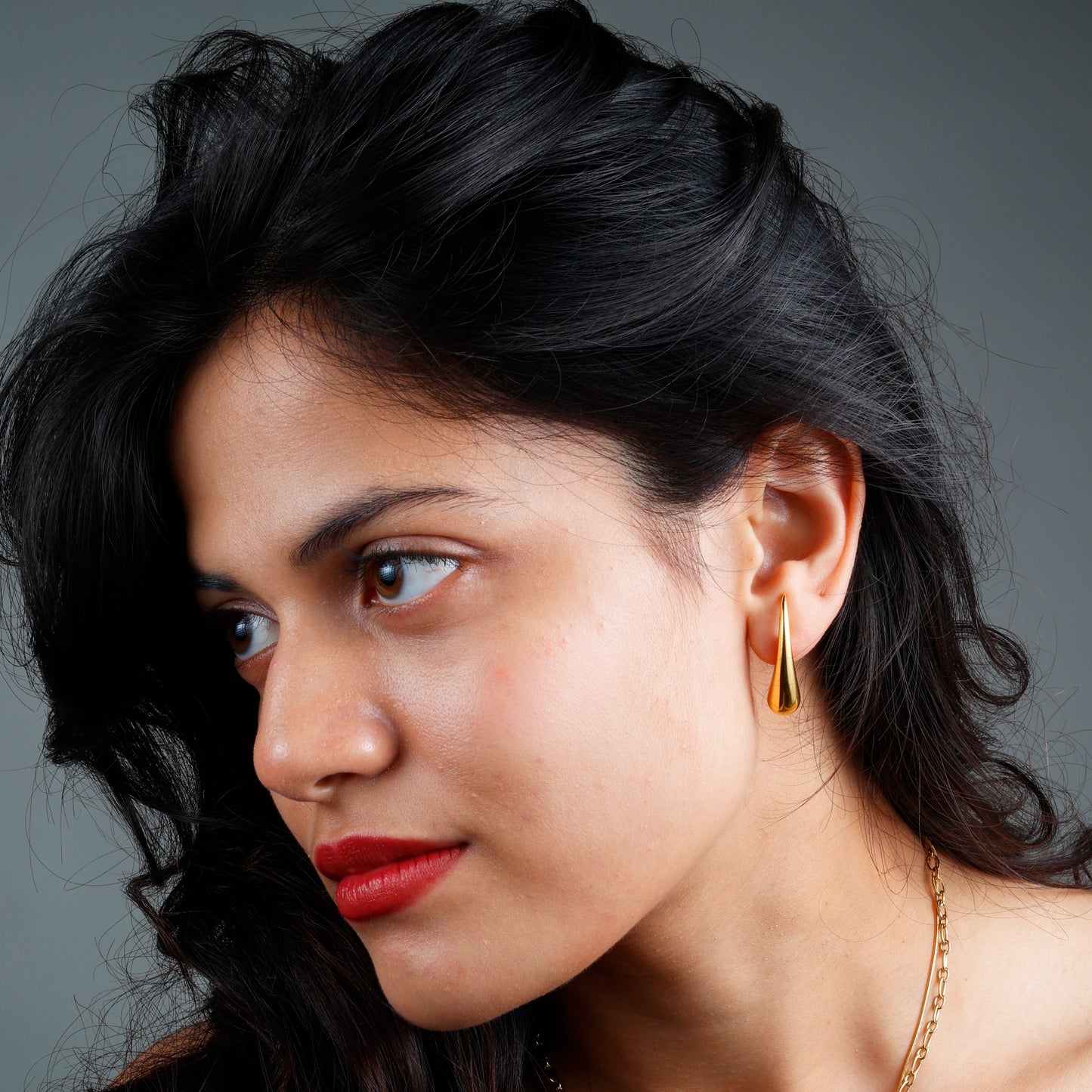 Elegant Minimalist Teardrop Earrings with yellow gold plating and anti-tarnish finish.