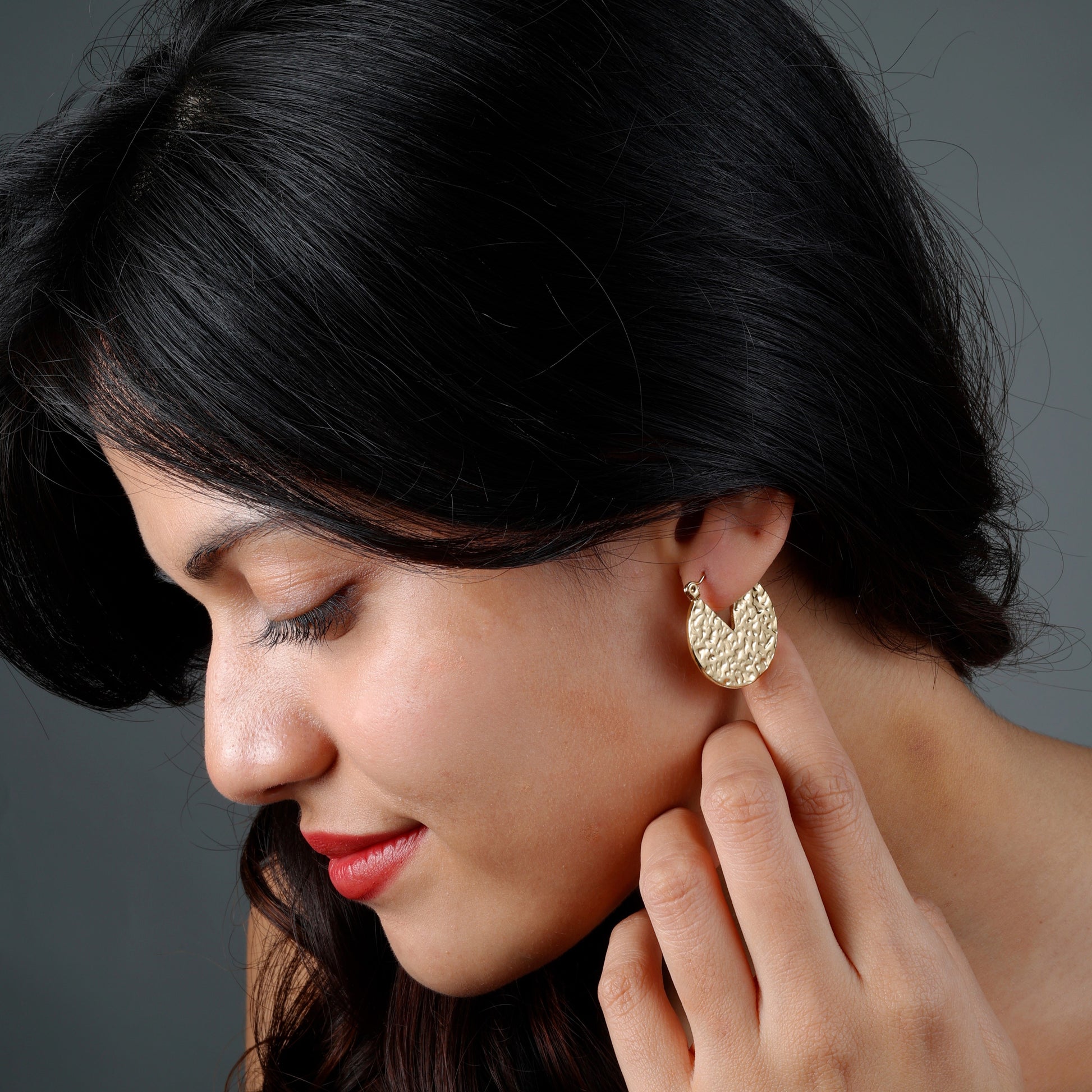 Elegant textured gold earrings with yellow gold plating, anti-tarnish finish, and hypoallergenic design.