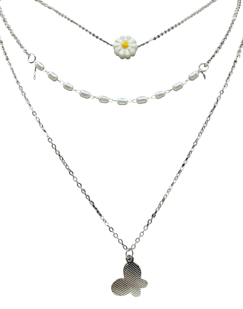 Rhodium-plated necklace with layered chains, pearls, and floral accents