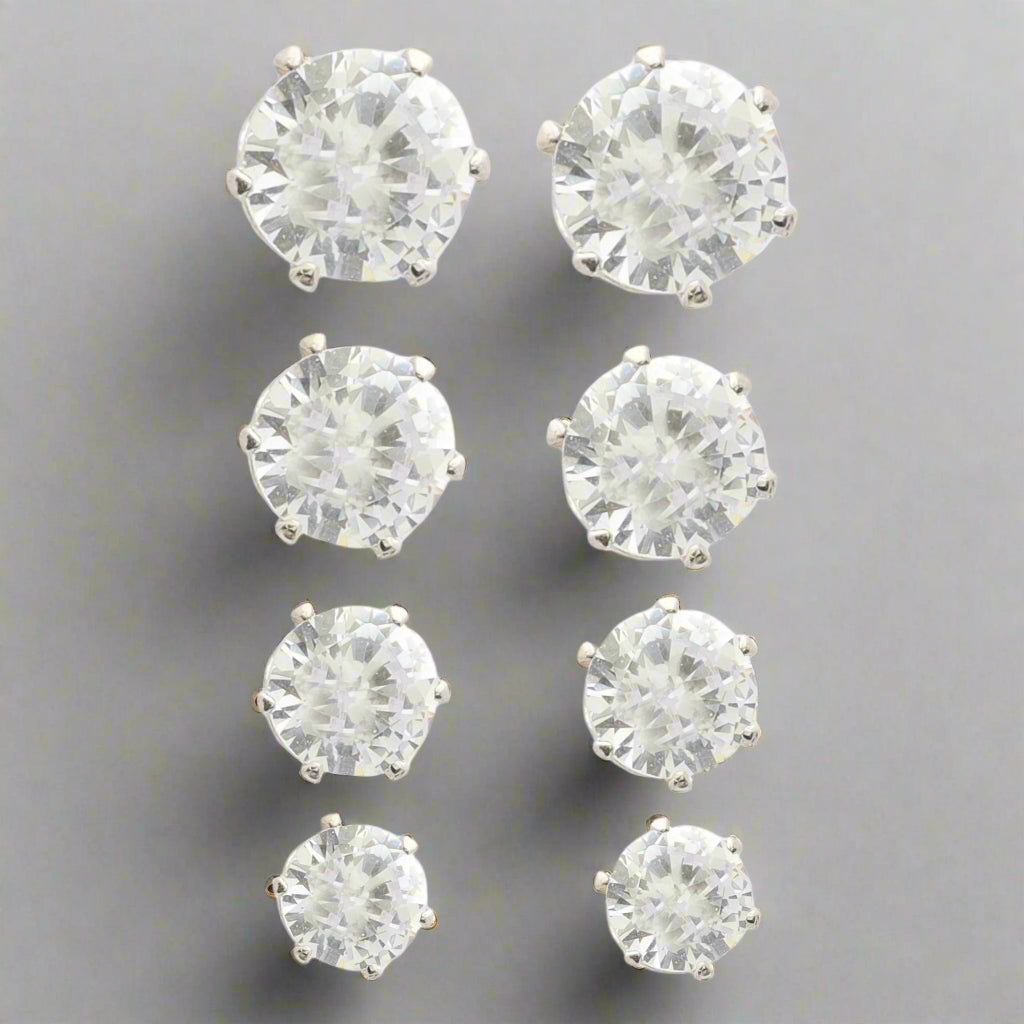 Set of 4 Crystal Cascade Stud Earrings in rhodium-plated silver with shimmering details.