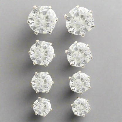 Set of 4 Crystal Cascade Stud Earrings in rhodium-plated silver with shimmering details.