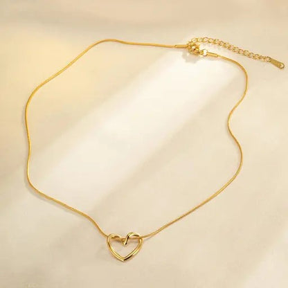 minimalist Heart's Curve Necklace with gold plating, symbolizing love - Peppy Pink 