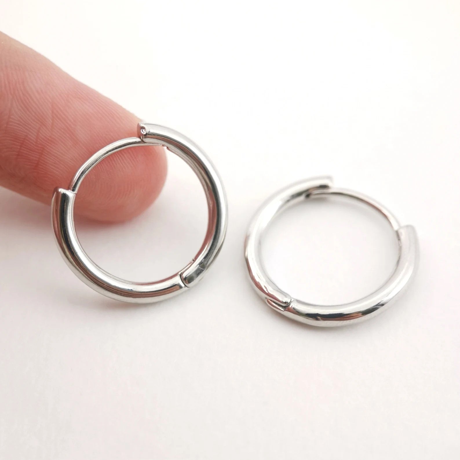 Classic endless hoop earrings in polished sterling silver

