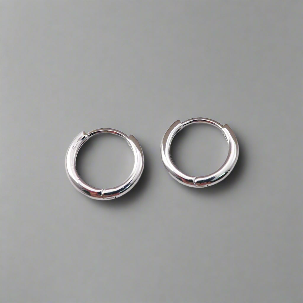 Bold silver-tone hoop earrings in rhodium plating – Peppy Pink