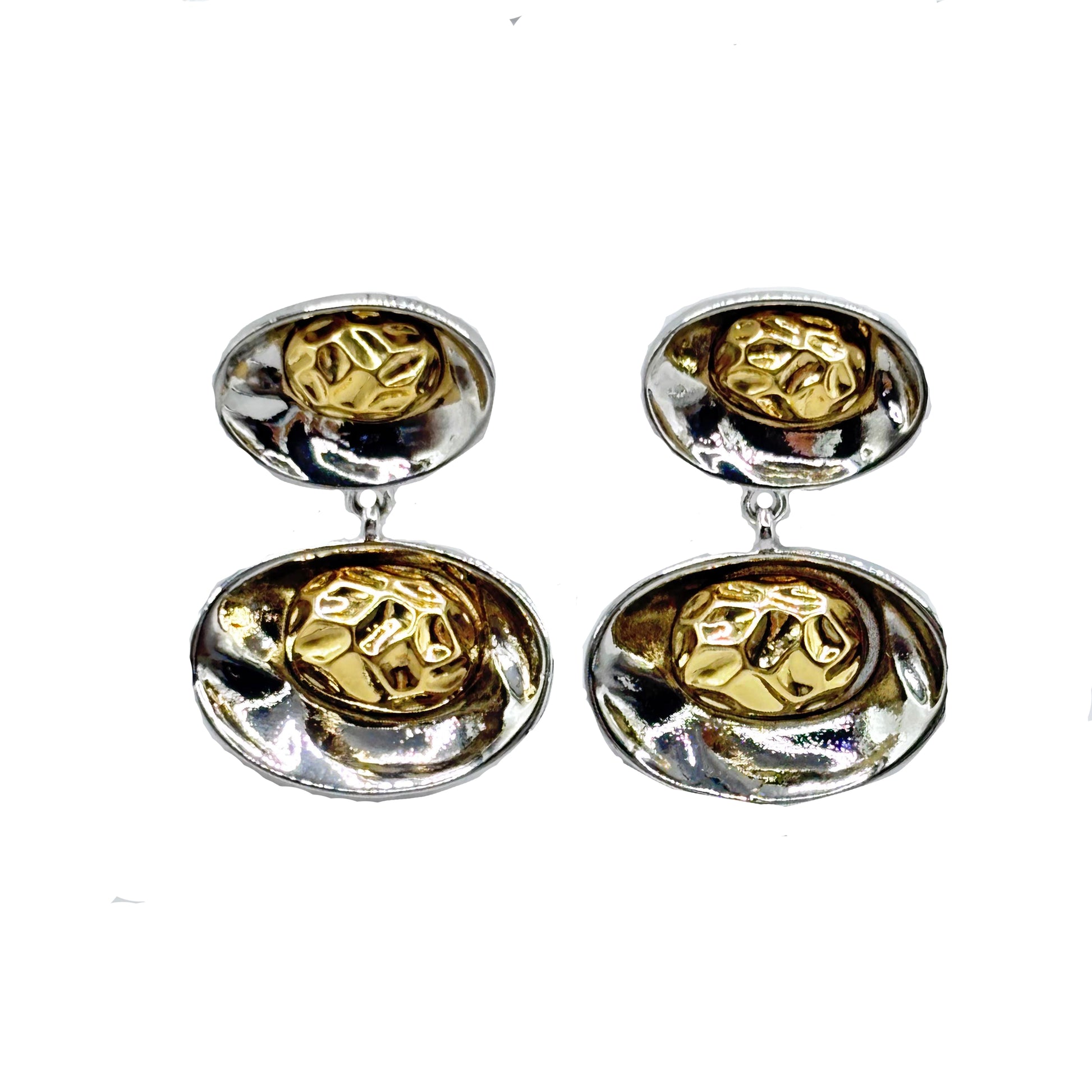 Bold oval-shaped dimpled earrings in rhodium and gold plating