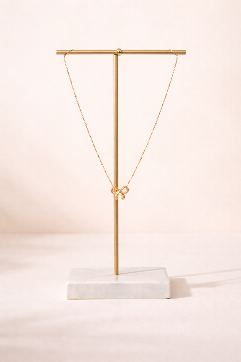 Golden Bow Charm Necklace