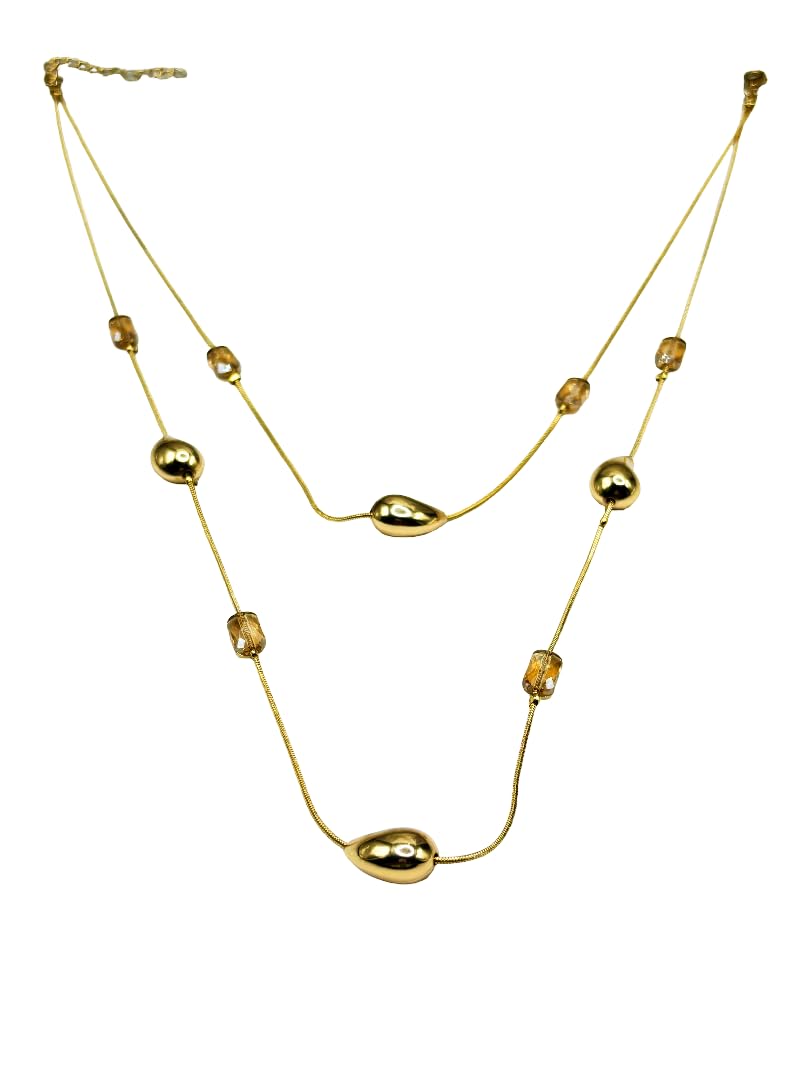 Layered gold necklace with delicate leaf pendants