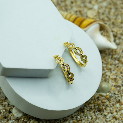 Sparkling bling hoop earrings, yellow gold-plated, hypoallergenic, and anti-tarnish—perfect for any occasion.