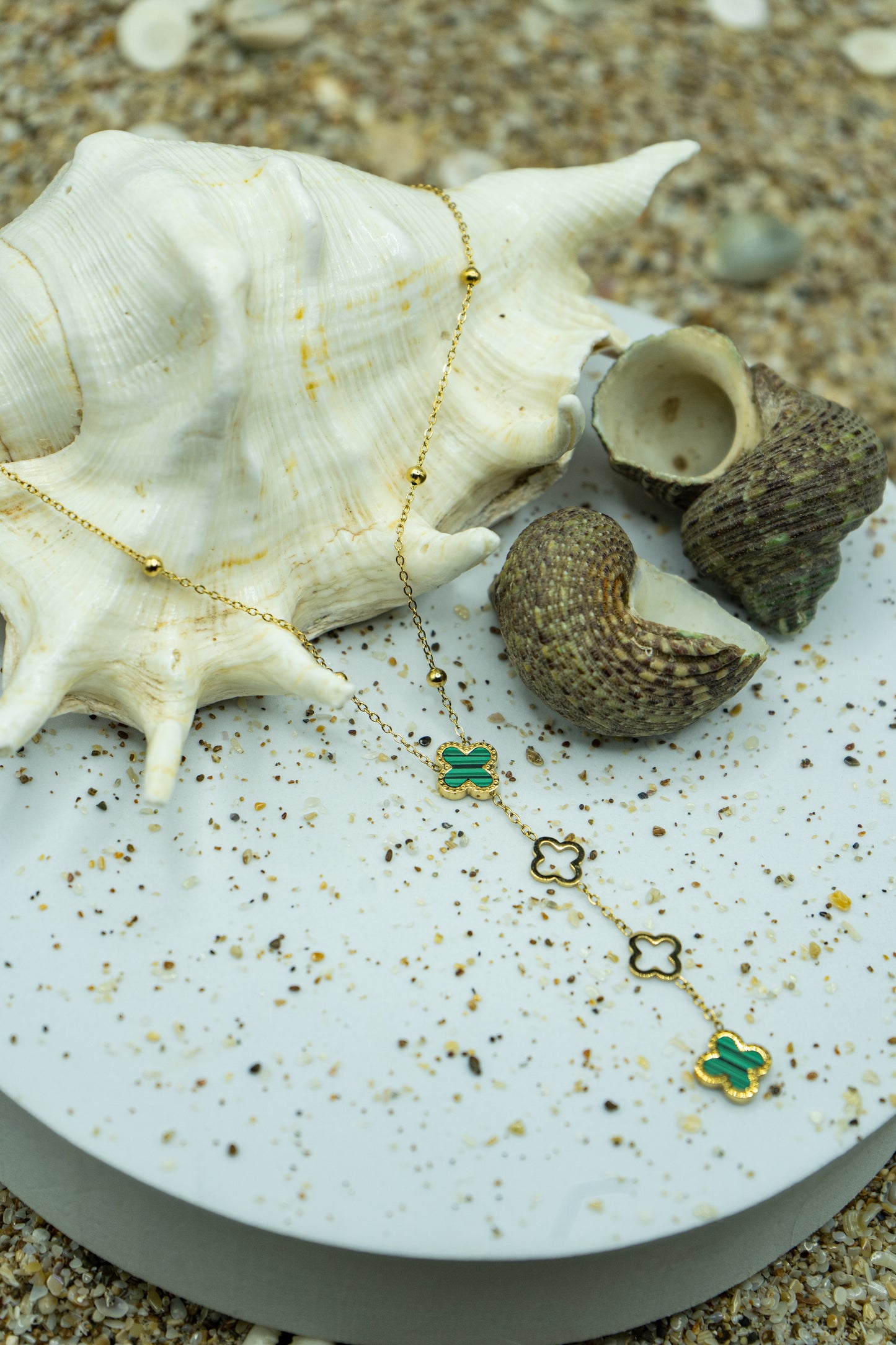 Elegant Clover Charm Necklace with yellow gold plating, anti-tarnish finish, and hypoallergenic design.