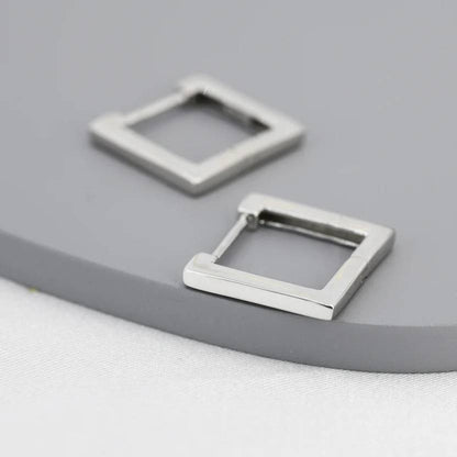 Bold and modern square-shaped silver studs