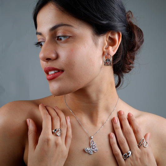 Elegant Pink Butterfly Necklace with rhodium plating, anti-tarnish finish, and hypoallergenic design.